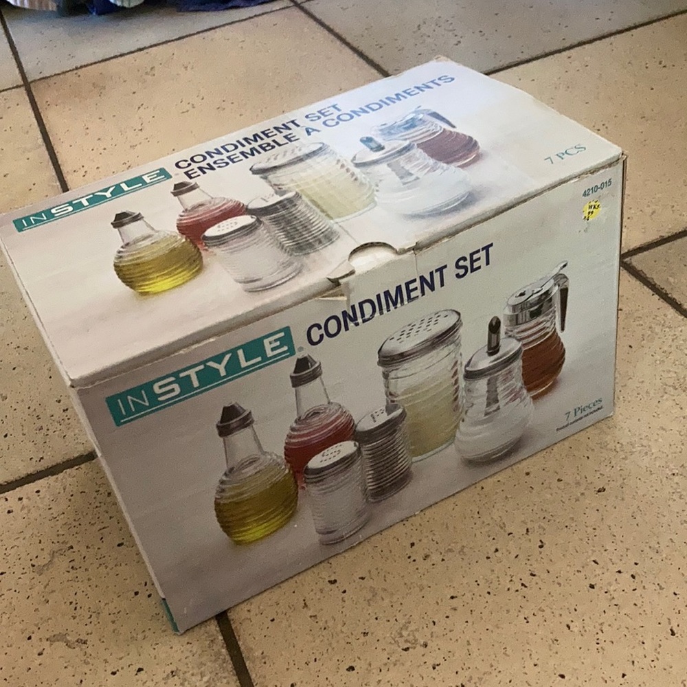 New Seven piece glass condiment set